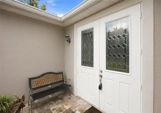 image of 555 Dowling Cir, Lady Lake, FL 32159 | MLS# OM730516