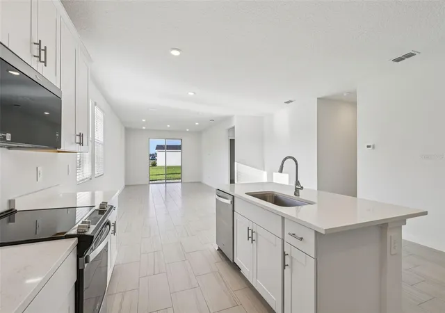 Photo 4 of Single family home for sale at 8 Garni Dr, Palm Coast, FL 32137 | MLS# TB8539461 | Listing updated on 2026-08-24