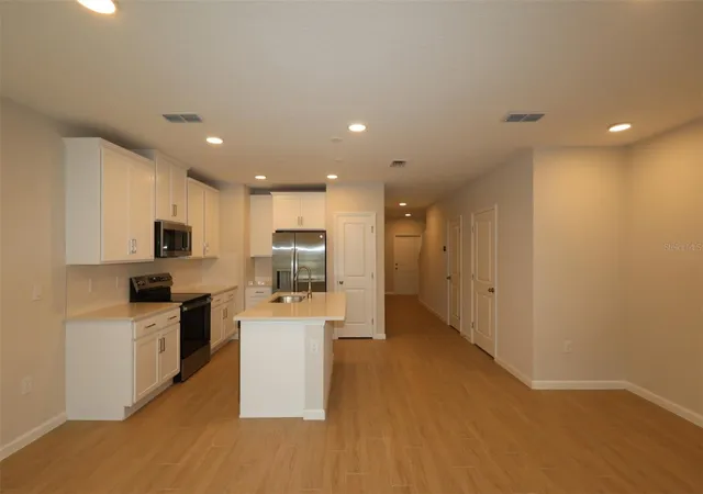 Photo 1 of Townhouse for sale at 6108 Fellow Wagon Way, Orlando, FL 32822 | MLS# O6434118 | Listing updated on 2026-09-11