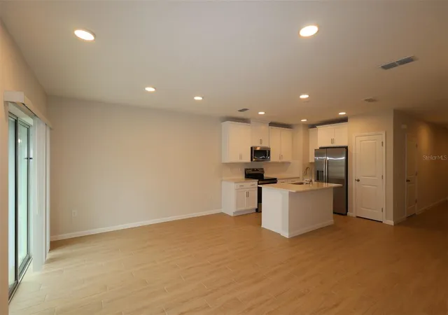 Photo 3 of Townhouse for sale at 6108 Fellow Wagon Way, Orlando, FL 32822 | MLS# O6434118 | Listing updated on 2026-09-11