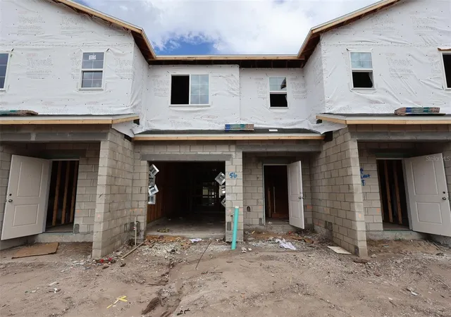 Photo 1 of Townhouse for sale at 6067 Fellow Wagon Way, Orlando, FL 32822 | MLS# O6434143 | Listing updated on 2026-09-11