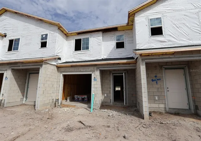 Photo 2 of Townhouse for sale at 6067 Fellow Wagon Way, Orlando, FL 32822 | MLS# O6434143 | Listing updated on 2026-10-06