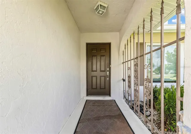 Photo 2 of Single family home for sale at 209 Rockwood St NW, Port Charlotte, FL 33952 | MLS# C7529663 | Listing updated on 2026-09-13
