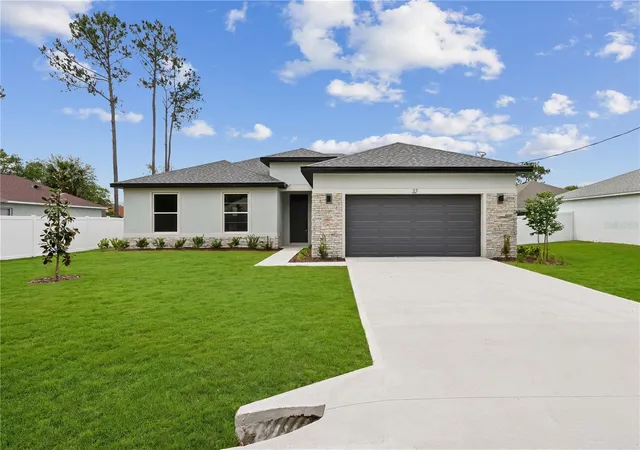 Photo 1 of Single family home for sale at 8 Lewisdale Pl, Palm Coast, FL 32137 | MLS# FC320743 | Listing updated on 2026-09-30