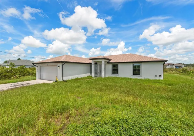 3rd image of 2710 70Th St W, Lehigh Acres, FL 33971 | MLS# TB8539648