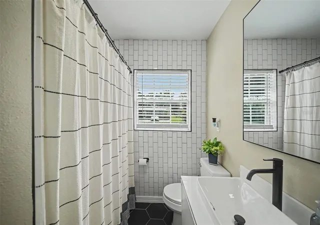 Photo 4 of Single family home for sale at 4636 W Bay Ct Ave, Tampa, FL 33611 | MLS# TB8539687 | Listing updated on 2026-10-29