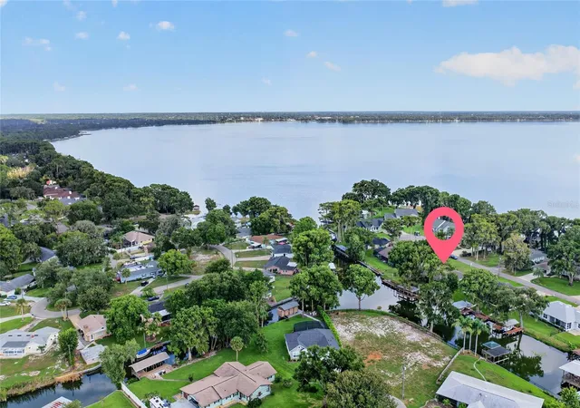 Photo 2 of Single family home for sale at 235 Temple Cir, Eustis, FL 32726 | MLS# O6434359 | Listing updated on 2026-08-28