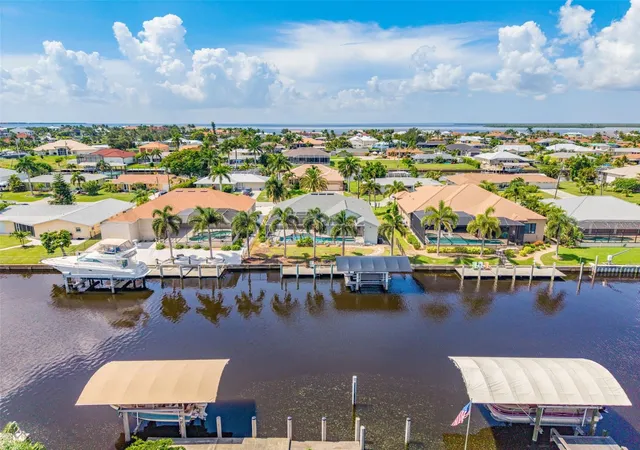 Photo 1 of Single family home for sale at 136 Peckham St Se, Port Charlotte, FL 33952 | MLS# C7529713 | Listing updated on 2026-10-07