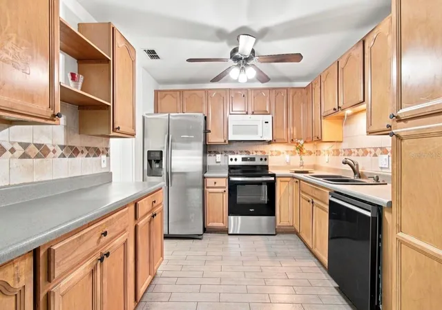 Photo 3 of Single family home for sale at 1932 Gregory Dr, Tampa, FL 33613 | MLS# W7888697 | Listing updated on 2026-09-26