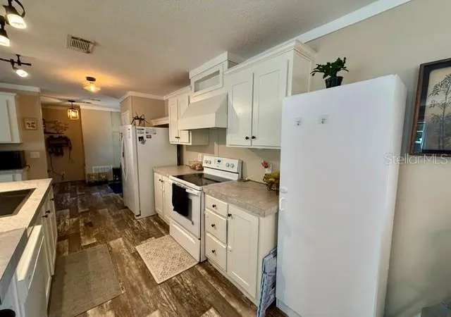 Photo 3 of Manufactured home for sale at 9825 Leguna St, New Port Richey, FL 34654 | MLS# TB8540017 | Listing updated on 2026-09-29