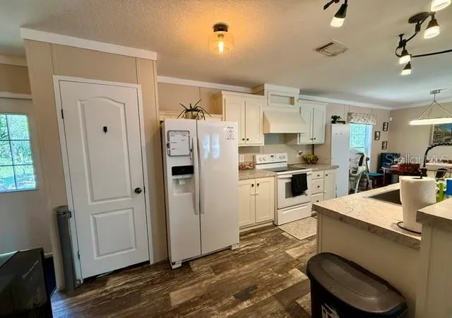 Photo 4 of Manufactured home for sale at 9825 Leguna St, New Port Richey, FL 34654 | MLS# TB8540017 | Listing updated on 2026-09-29