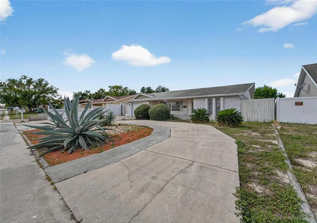 Photo 3 of Single family home for sale at 10841 Piccadilly Rd, Port Richey, FL 34668 | MLS# TB8540052 | Listing updated on 2026-10-01