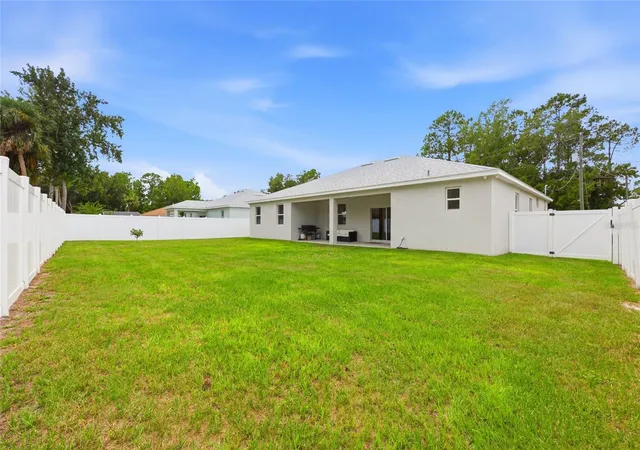 Photo 4 of Single family home for sale at 5 Pine Bush Ln, Palm Coast, FL 32164 | MLS# FC320784 | Listing updated on 2026-10-21
