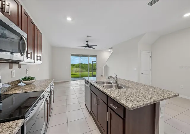 Photo 3 of Townhouse for sale at 8657 Milestone Dr, Sarasota, FL 34238 | MLS# A4703365 | Listing updated on 2026-09-21