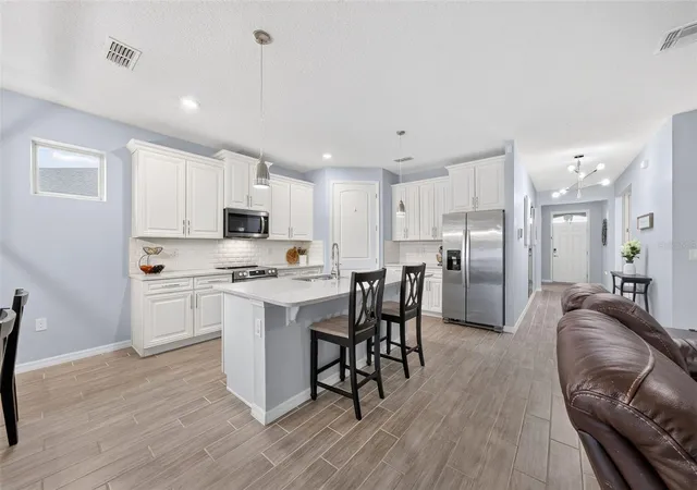 Photo 4 of Single family home for sale at 1446 Savoy Ln, Sanford, FL 32771 | MLS# O6434665 | Listing updated on 2026-10-03