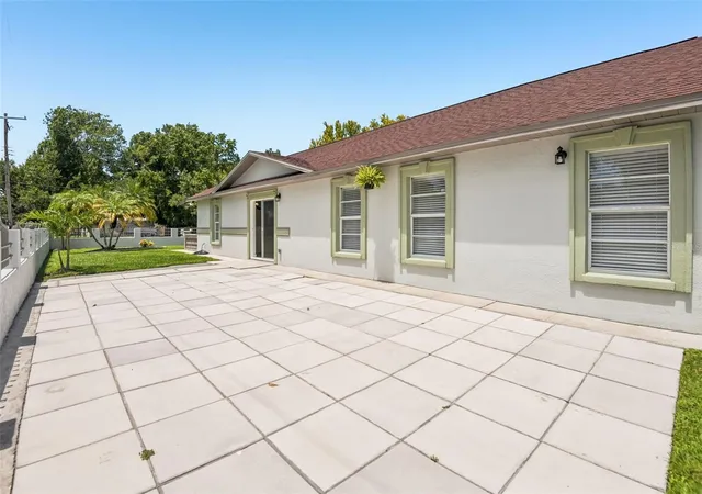Photo 3 of Single family home for sale at 7001 N Clark Ave, Tampa, FL 33614 | MLS# TB8540155 | Listing updated on 2026-09-21
