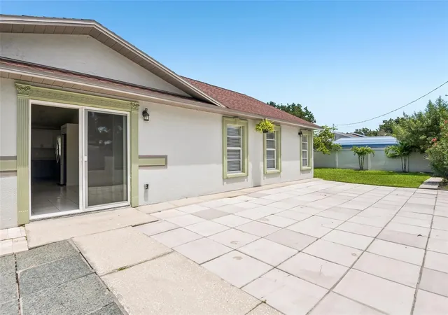 Photo 4 of Single family home for sale at 7001 N Clark Ave, Tampa, FL 33614 | MLS# TB8540155 | Listing updated on 2026-09-21