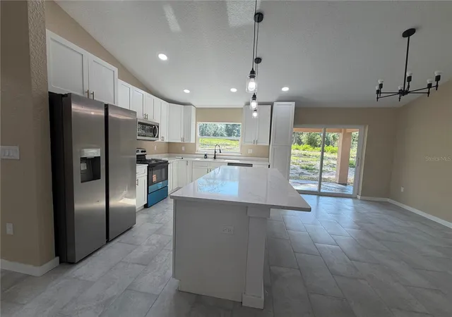 Photo 3 of Single family home for sale at 13268 SE 44th Court, Belleview, FL 34420 | MLS# OM730663 | Listing updated on 2026-09-13
