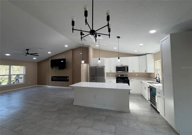 Photo 4 of Single family home for sale at 13268 SE 44th Court, Belleview, FL 34420 | MLS# OM730663 | Listing updated on 2026-09-13