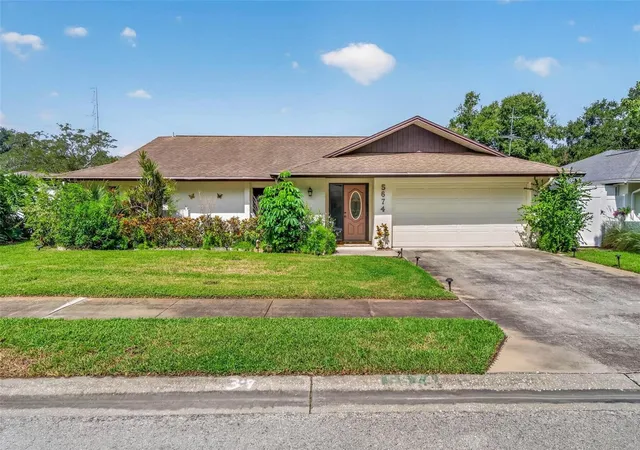 Photo 1 of Single family home for sale at 5674 Bay Pines Lakes Blvd, Saint Petersburg, FL 33708 | MLS# TB8540190 | Listing updated on 2026-09-13