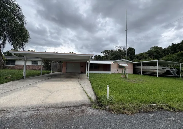 1st image of 1650 Aqua Ln, Holiday, FL 34691 | MLS# O6434724