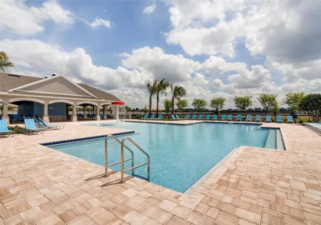 Photo 2 of Townhouse for sale at 9033 Wildflower Ln, Kissimmee, FL 34747 | MLS# O6434728 | Listing updated on 2026-10-07