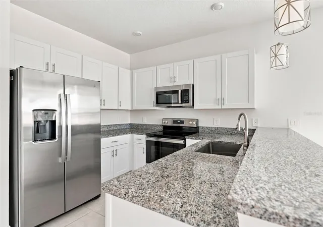 Photo 4 of Townhouse for sale at 10317 Trumpet Honeysuckle Wy, San Antonio, FL 33576 | MLS# TB8540235 | Listing updated on 2026-09-25