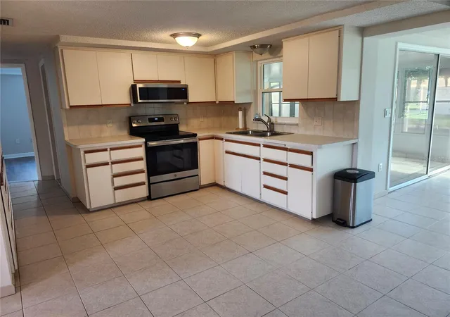Photo 2 of Single family home for sale at 6144 Sapphire Dr, New Port Richey, FL 34653 | MLS# R4911841 | Listing updated on 2026-10-21