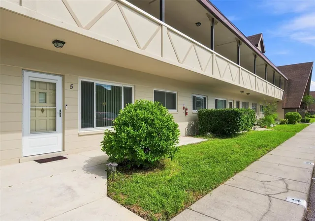Photo 1 of Condo for sale at 2295 Belgian Ln #5, Clearwater, FL 33763 | MLS# W7888731 | Listing updated on 2026-09-04