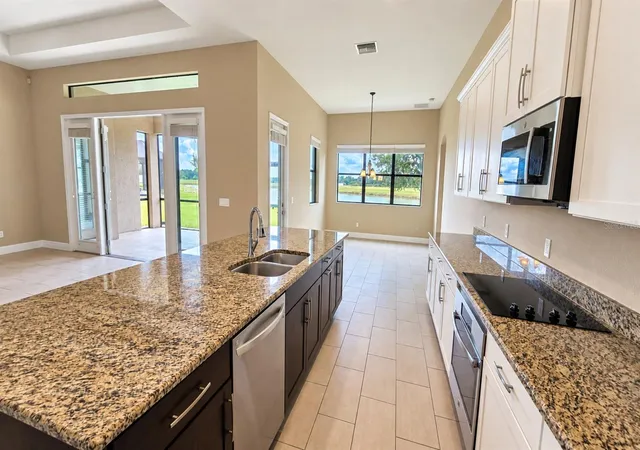 Photo 4 of Single family home for sale at 10619 Mistflower Ln, Tampa, FL 33647 | MLS# TB8540400 | Listing updated on 2026-09-05
