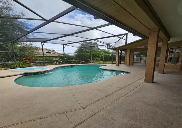 Photo 2 of Single family home for sale at 7741 Bardmoor Hl Cir, Orlando, FL 32835 | MLS# O6434862 | Listing updated on 2026-09-26