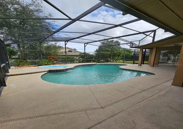 Photo 3 of Single family home for sale at 7741 Bardmoor Hl Cir, Orlando, FL 32835 | MLS# O6434862 | Listing updated on 2026-09-26