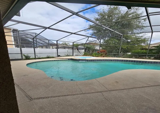 Photo 3 of Single family home for sale at 7741 Bardmoor Hl Cir, Orlando, FL 32835 | MLS# O6434862 | Listing updated on 2026-09-26