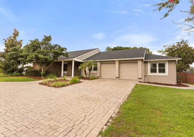 Photo 2 of Single family home for sale at 7449 Sparkling Lake Rd, Orlando, FL 32819 | MLS# O6434904 | Listing updated on 2026-09-13