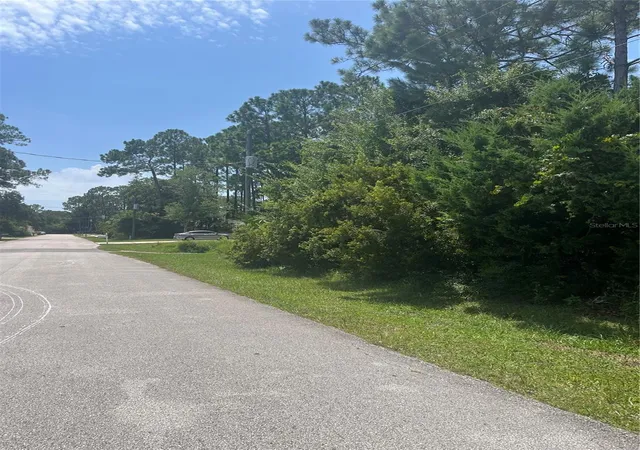 2nd image of 31 Bunker Knolls Ln, Palm Coast, FL 32137 | MLS# FC320817