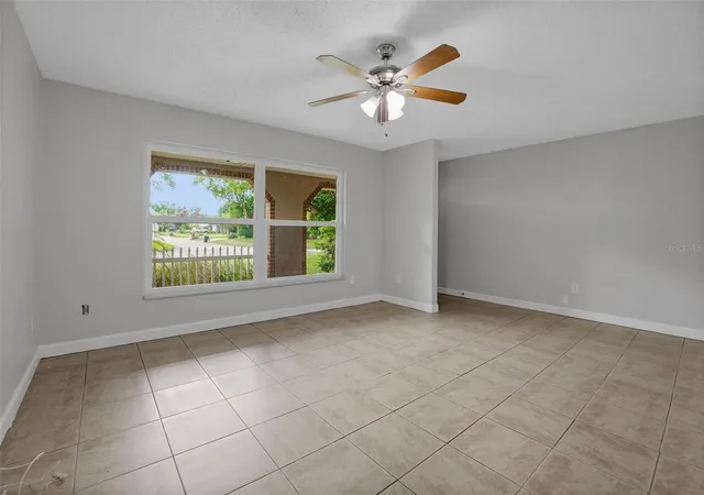 5th image of 169 Leisure Cir, Port Orange, FL 32127 | MLS# O6435021