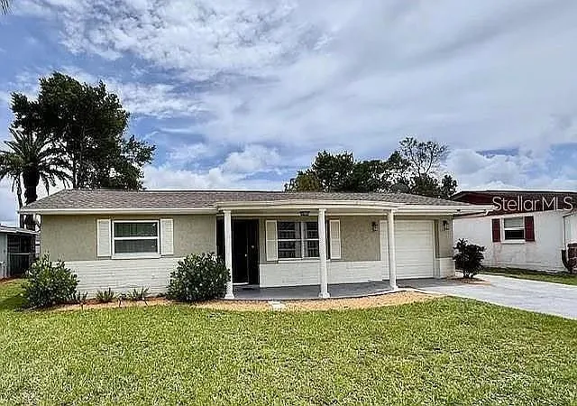 Photo 1 of Single family home for sale at 7310 Ivanhoe Dr, Port Richey, FL 34668 | MLS# W7888755 | Listing updated on 2026-08-21