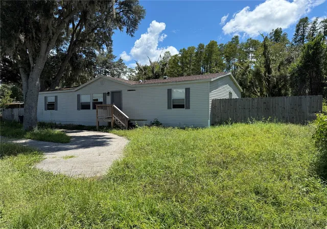 Photo 1 of Manufactured home for sale at 19036 Brewer Rd, Land O Lakes, FL 34638 | MLS# TB8540719 | Listing updated on 2026-09-29