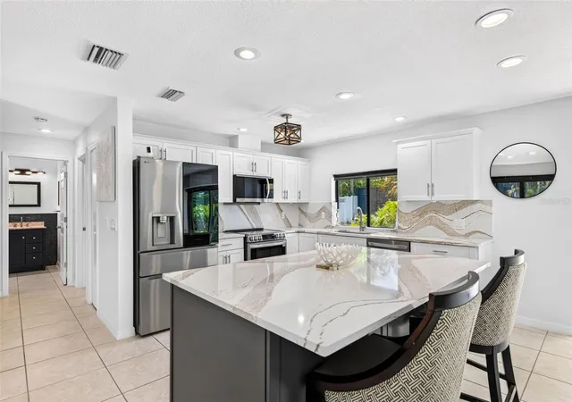 Photo 4 of Single family home for sale at 114 12th Street, Belleair Beach, FL 33786 | MLS# TB8540721 | Listing updated on 2026-08-21