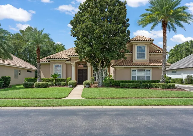 Photo 1 of Single family home for sale at 5119 Keeneland Cir, Orlando, FL 32819 | MLS# O6435179 | Listing updated on 2026-09-25