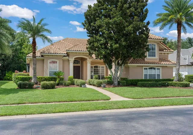 Photo 2 of Single family home for sale at 5119 Keeneland Cir, Orlando, FL 32819 | MLS# O6435179 | Listing updated on 2026-09-25