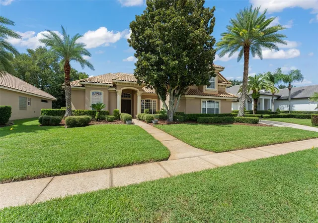 Photo 3 of Single family home for sale at 5119 Keeneland Cir, Orlando, FL 32819 | MLS# O6435179 | Listing updated on 2026-09-25