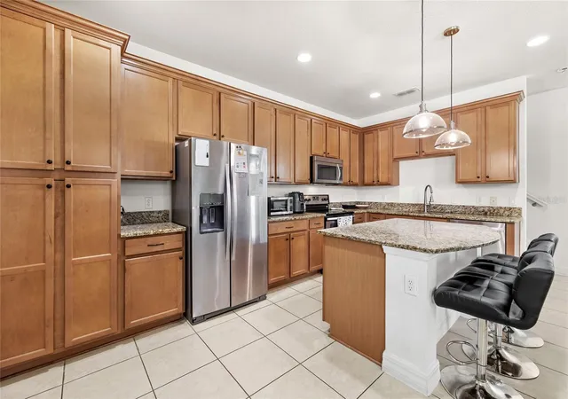 Photo 3 of Townhouse for sale at 10155 Eagle Crk Ctr Blvd, Orlando, FL 32832 | MLS# O6435181 | Listing updated on 2026-09-01