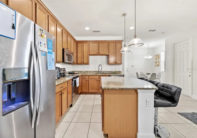 Photo 3 of Townhouse for sale at 10155 Eagle Crk Ctr Blvd, Orlando, FL 32832 | MLS# O6435181 | Listing updated on 2026-09-01