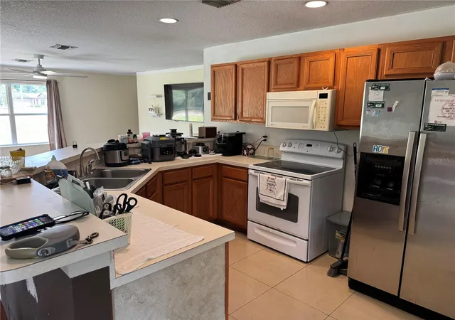 Photo 3 of Single family home for sale at 609 Kissimmee Ln, Kissimmee, FL 34759 | MLS# O6435205 | Listing updated on 2026-08-22