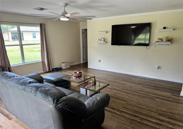 Photo 4 of Single family home for sale at 609 Kissimmee Ln, Kissimmee, FL 34759 | MLS# O6435205 | Listing updated on 2026-08-22