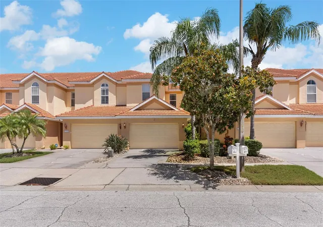 Photo 1 of Townhouse for sale at 1437 Ridge Ter, Tarpon Springs, FL 34689 | MLS# TB8540819 | Listing updated on 2026-09-03
