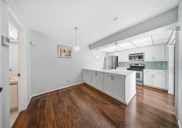 Photo 4 of Condo for sale at 5256 Cypress Ct #703, Orlando, FL 32811 | MLS# O6435259 | Listing updated on 2026-09-04