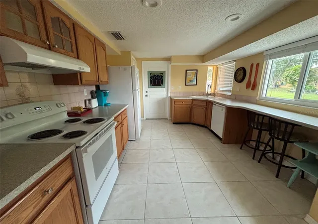 Photo 4 of Single family home for sale at 650 Hartford Dr Nw, Port Charlotte, FL 33952 | MLS# A4703575 | Listing updated on 2026-09-06