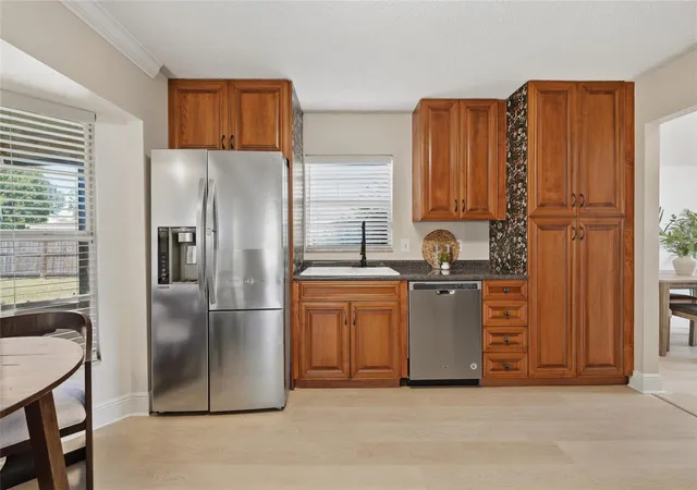 Photo 3 of Single family home for sale at 1437 Mona Dr, Kissimmee, FL 34744 | MLS# O6435299 | Listing updated on 2026-10-04